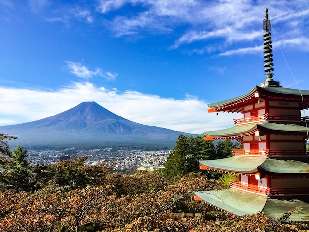 Foto ponto famoso da montanha de fuji com um pagode vermelho à parte