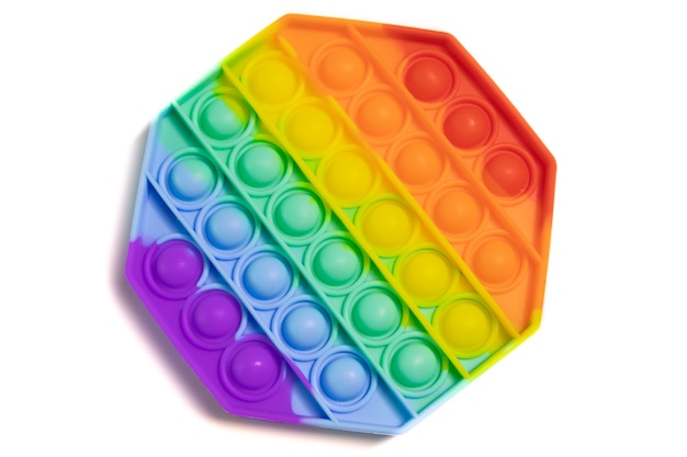 Pop it Antistress Zappelspielzeug buntes Regenbogenspiel isoliert auf weißem Hintergrund