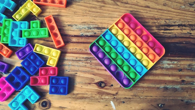 Pop it fidget brinquedo quadrado arco-íris e quebra-cabeças