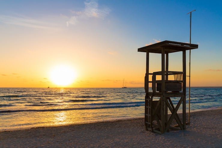 Foto pôr do sol de maiorca na praia de es trenc em campos
