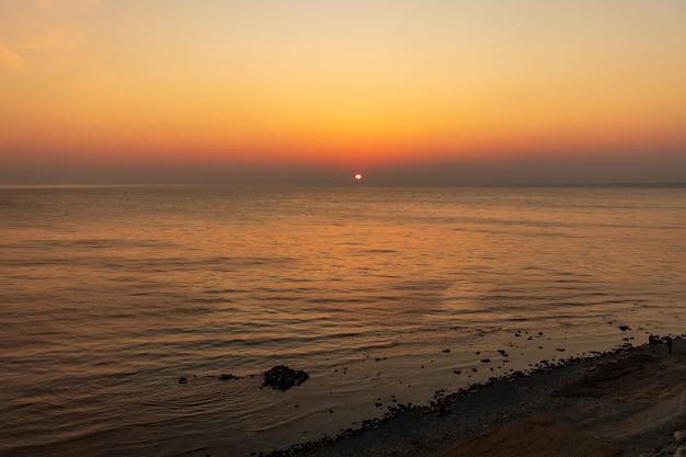 Pôr do sol e praia