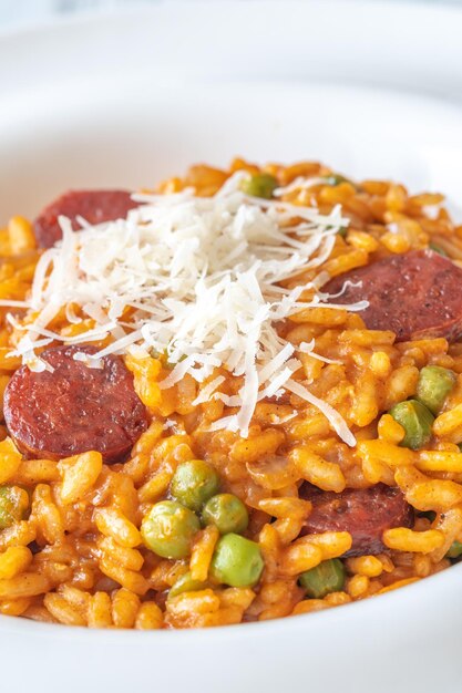 Foto porção de chorizo risotto