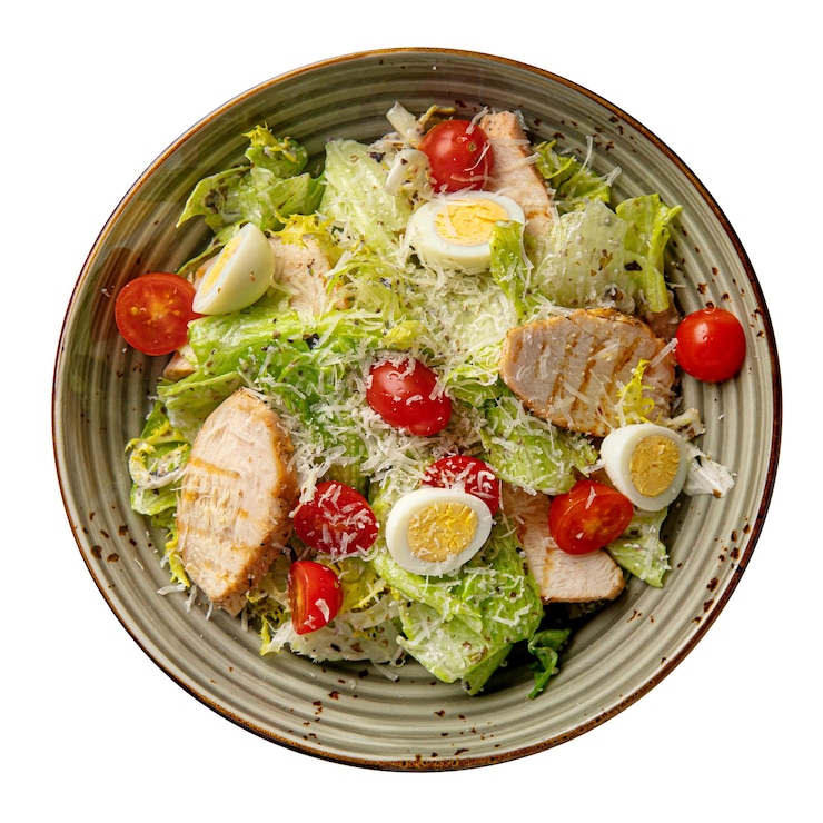 Foto porção de salada césar com frango