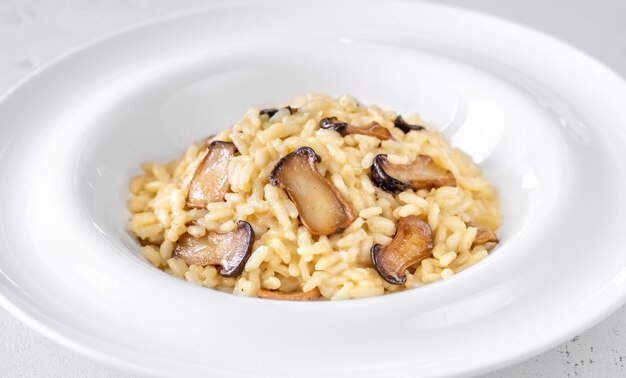 Porción de risotto con champiñones