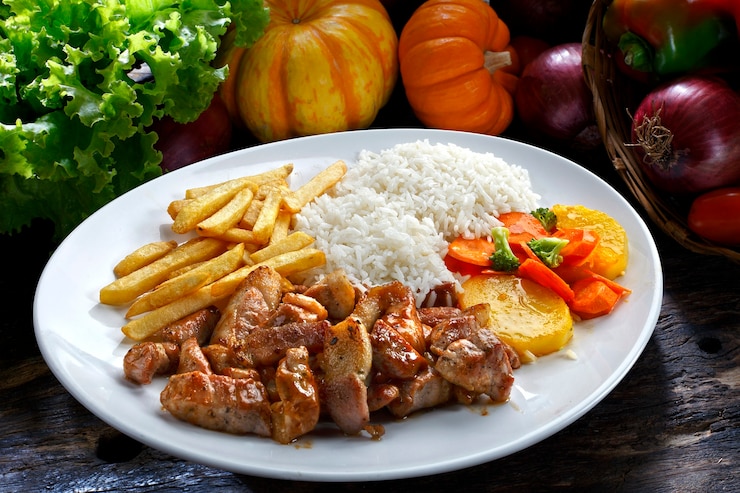 Foto porco com arroz e batata