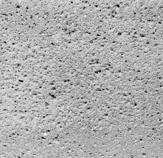 Foto porosidade cinzenta pedra, fundo de textura