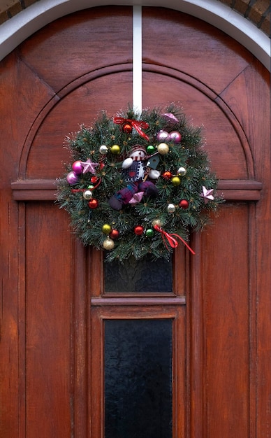 Foto porta de grinalda decoração de ano novo casa guirlanda frente festa de entrada