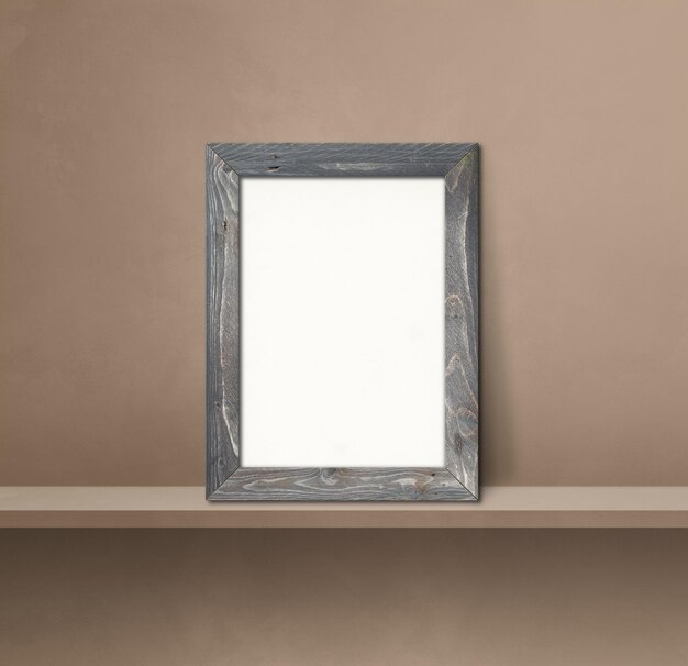 Foto porta-retrato de madeira encostado em uma prateleira marrom. ilustração 3d. modelo de maquete em branco. fundo quadrado