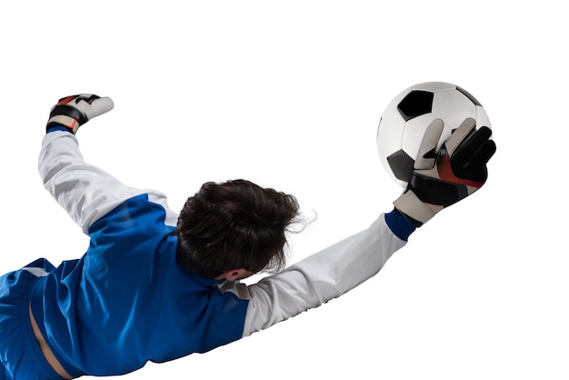 Foto el portero atrapa el balón en el estadio durante un partido de fútbol.