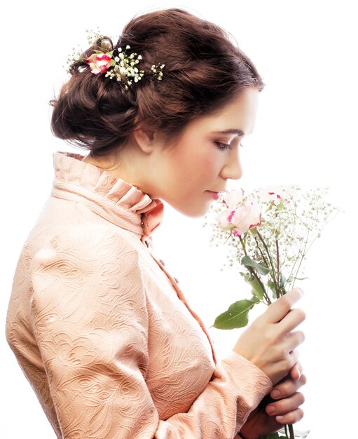 Porträt der schönen jungen Braut im rosa Kleid