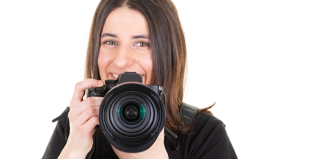 Porträt des Frauenmädchenfotografen auf einem weißen Hintergrund