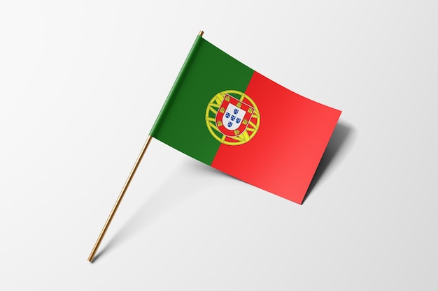 Foto portugal pequena bandeira de papel no fundo branco