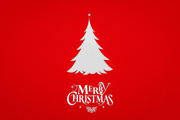 Postal de Navidad de la vendimia con el verdadero papel del árbol de navidad