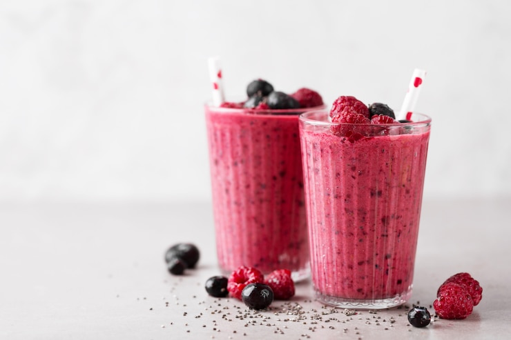 Foto postre de batido rojo apetitoso saludable en vasos