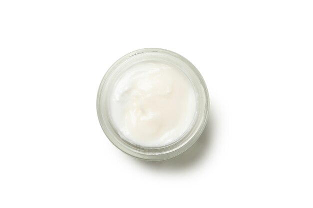 Pote de creme cosmético isolado