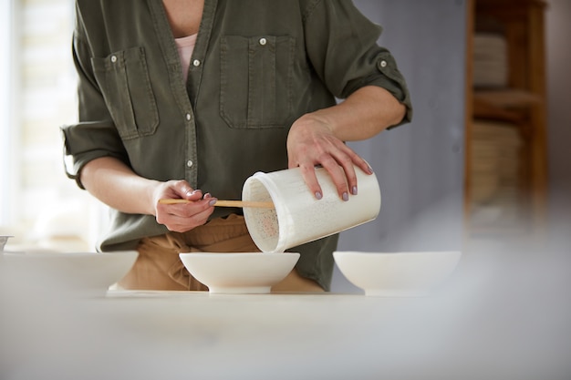 Potter Mixing Glaze