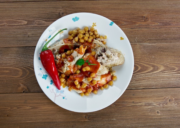 Poulet Chtitha - Pollo estofado con garbanzos y salsa. Cocina argelina