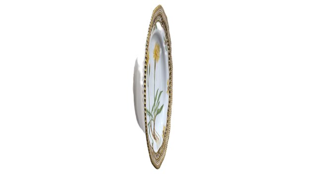 Prato oval em ouro e branco com uma flor no fundo.