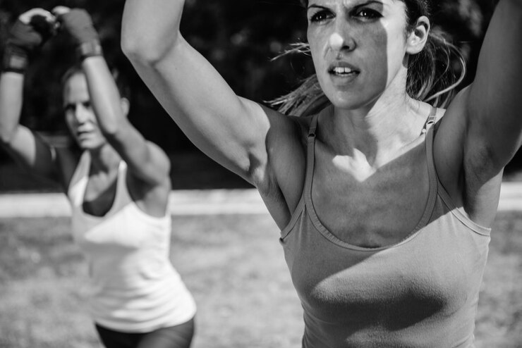 Foto presentación de tae bo al aire libre