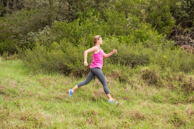 Pretty blond athletic jogging