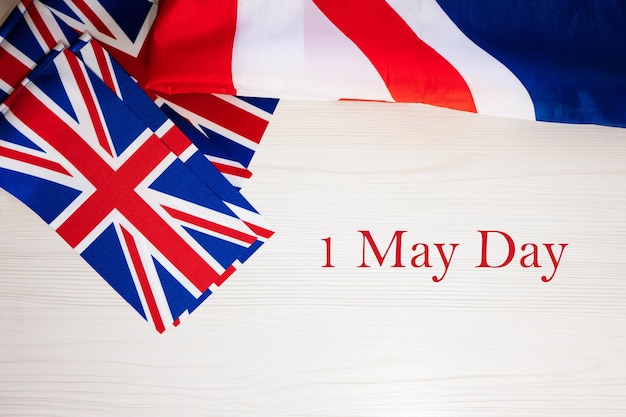 Primeiro do conceito de feriados britânicos do dia de maio Feriado no fundo da bandeira do Reino Unido Grã-Bretanha