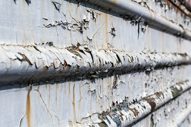 Primer agrietado viejo de la textura del fondo de la pintura oxidada