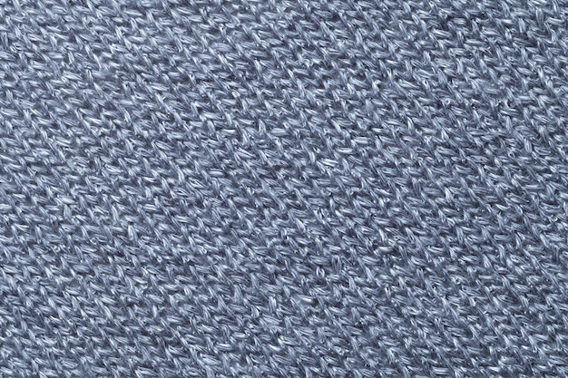 Primer azul del fondo de la materia textil. Estructura de la macro de la tela.