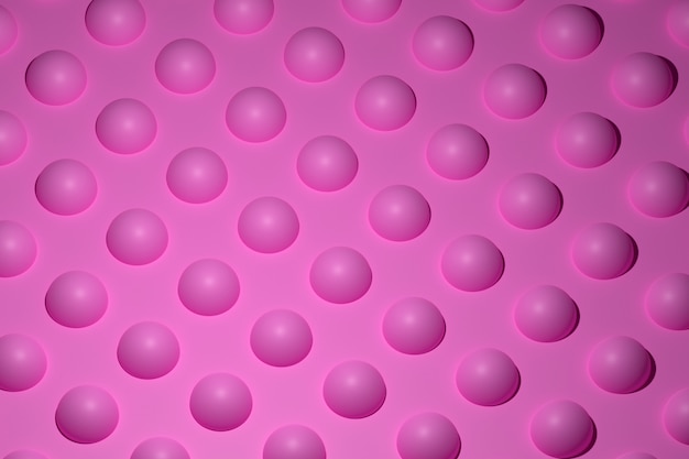 Foto primer ejemplo monocromático 3d: bolas idénticas rosadas dispuestas a la misma distancia. formas geométricas simples en una fila.