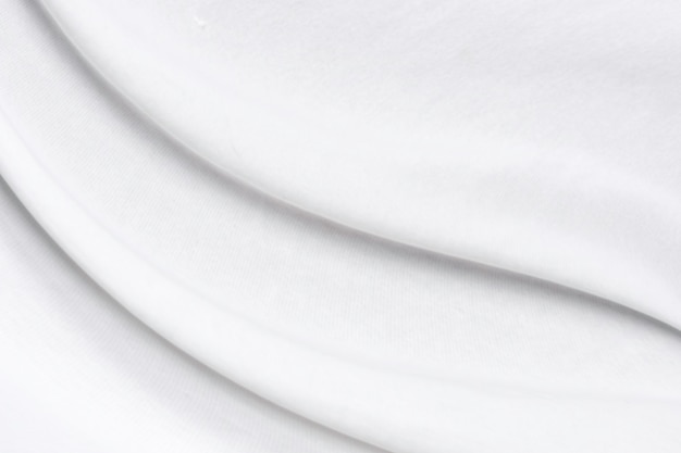 Primer plano 3D elegante arrugado de fondo de tela de seda blanca y textura Diseño de fondo de lujoImagen