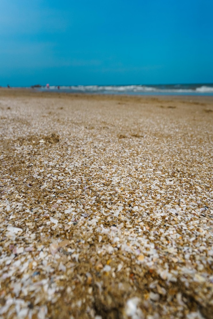 Foto primer plano de arena en la playa contra el cielo