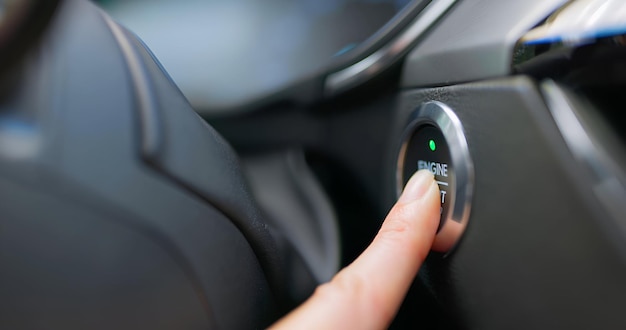 Foto primer plano de arranque de botón del motor del coche