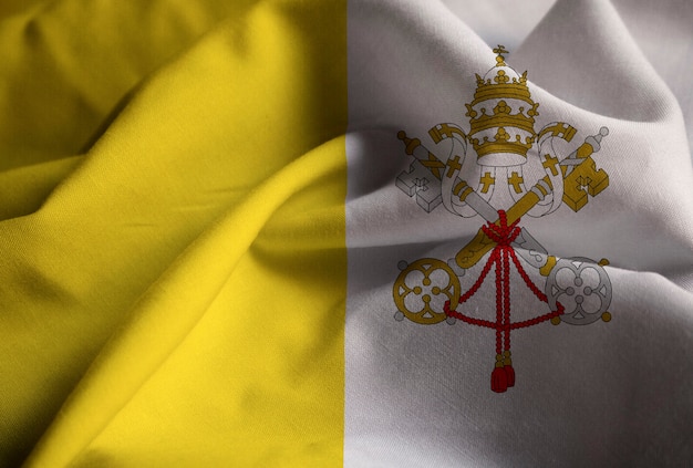 Foto primer plano de la bandera de la ciudad del vaticano con volantes, bandera de la ciudad del vaticano soplando en el viento