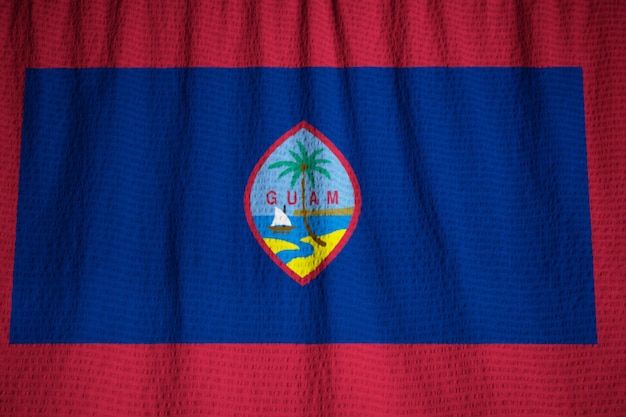 Primer plano de la bandera de Guam con volantes, bandera de Guam que sopla en el viento