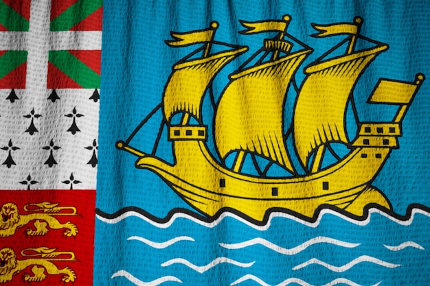 Primer plano de la bandera de Saint Pierre y Miquelon con volantes