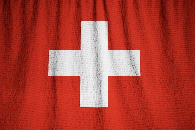 Primer plano de la bandera de Suiza con volantes