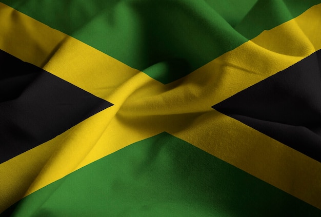 Primer plano de la bandera con volantes de Jamaica, bandera de Jamaica soplando en el viento