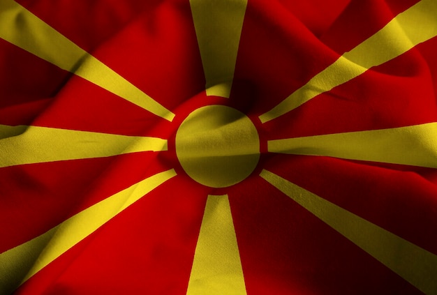 Foto primer plano de la bandera con volantes de macedonia, bandera de macedonia soplando en el viento