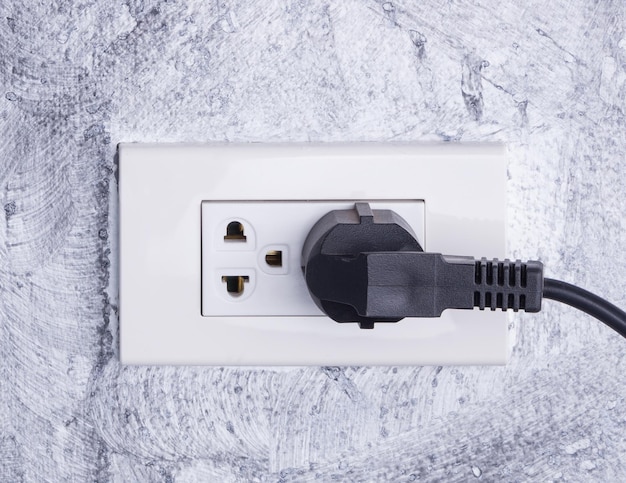 Primer plano de una cabina telefónica en la pared