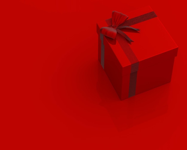 Primer plano de una caja de regalos sobre un fondo rojo