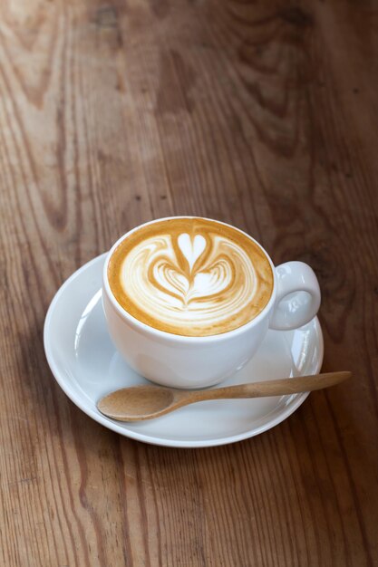 Foto primer plano de un capuchino en la mesa