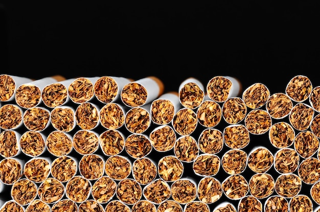 Primer plano de cigarrillos de tabaco Antecedentes o textura