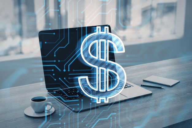 Primer plano de la computadora portátil en el escritorio con la libreta de la taza de café signo de circuito de dólar brillante sobre fondo borroso Concepto de transacción de dinero digital Doble exposición