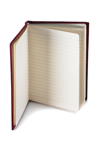 Primer plano de un cuaderno esponjoso de terciopelo en blanco sobre fondo blanco con trazado de recorte