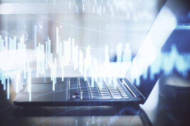 Primer plano de un cuaderno con gráfico de forex