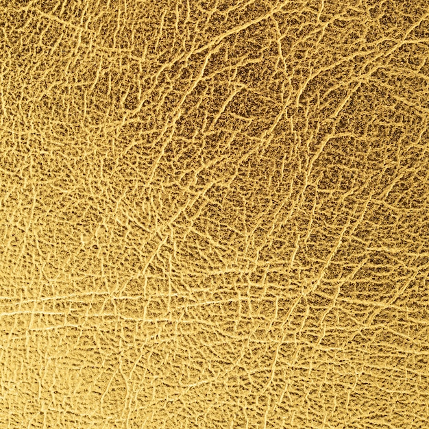 Primer plano de fondo de textura de cuero dorado