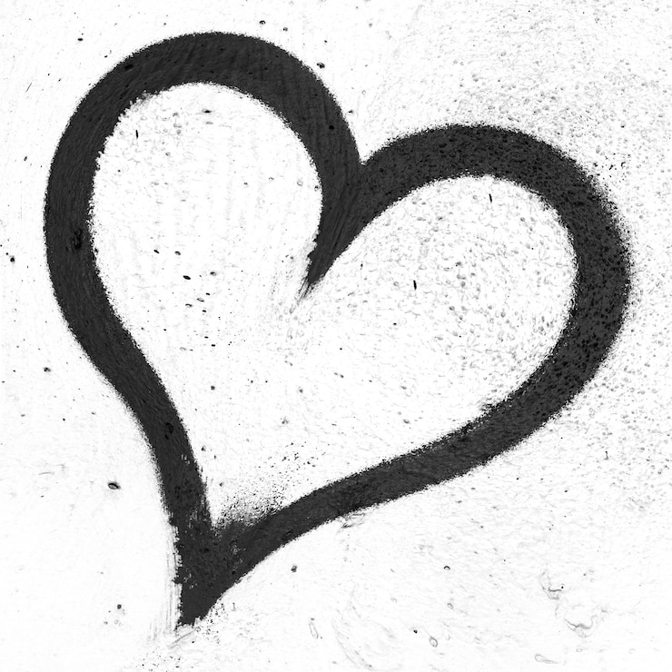 Foto primer plano en forma de corazón en una pared pintada