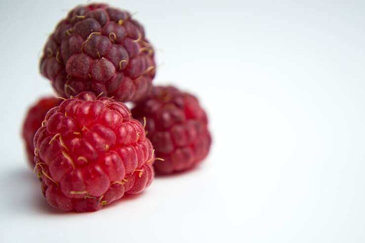 Foto primer plano de frambuesas frescas perfectas para un blog culinario dieta y los beneficios de la vi natural