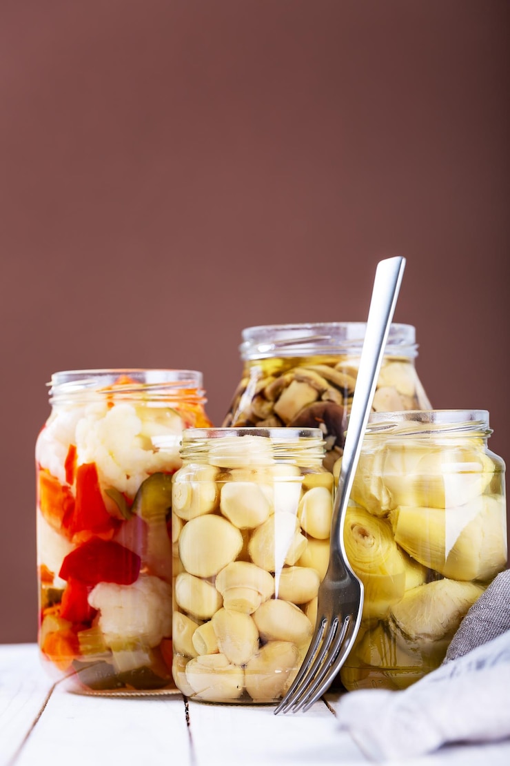 Foto primer plano de frutas en frasco de vidrio en la mesa
