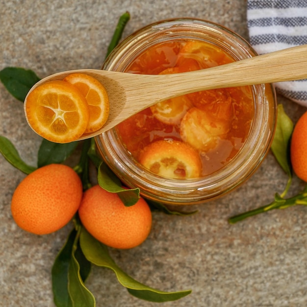 Foto primer plano de frutas de naranja en frasco