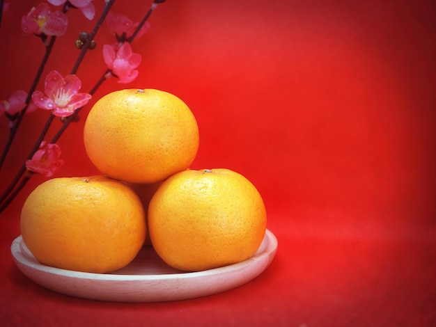 Foto primer plano de frutas de naranja en la mesa